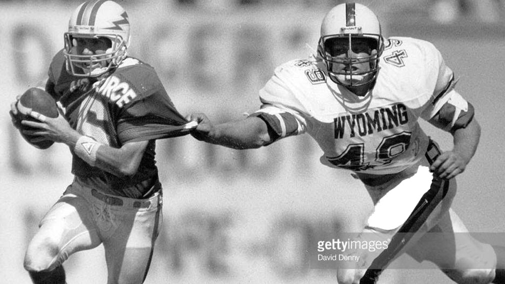 Mitch Donahue attended the University of Wyoming on a football scholarship. I was named Defensive player of the year for the Western Athletic Conferenced in 1989 and 1990 as well as being named to the first team All- decade team for the 80’s.